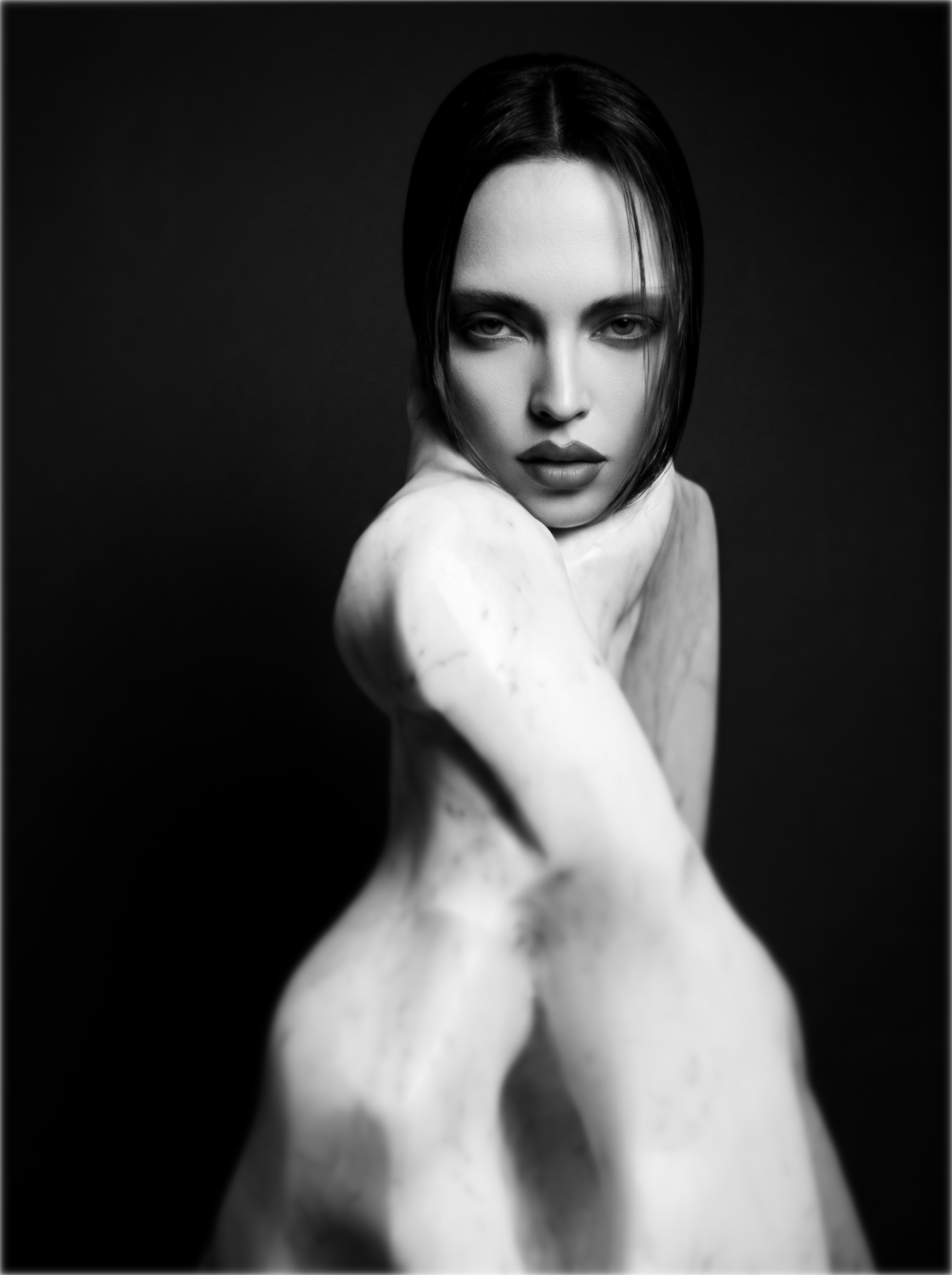 Sculpted marble figure on a black field — the stage for ‘Handle objections your way’